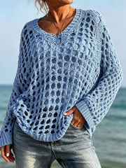 Front view of light blue openwork crochet knit cover up with V neck at the beach.
