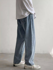 Men's Air Force Blue loose fit wash jeans on model, back view showing rear pockets.