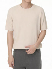 Men's short-sleeve knit T-shirt featuring a ribbed fabric texture.