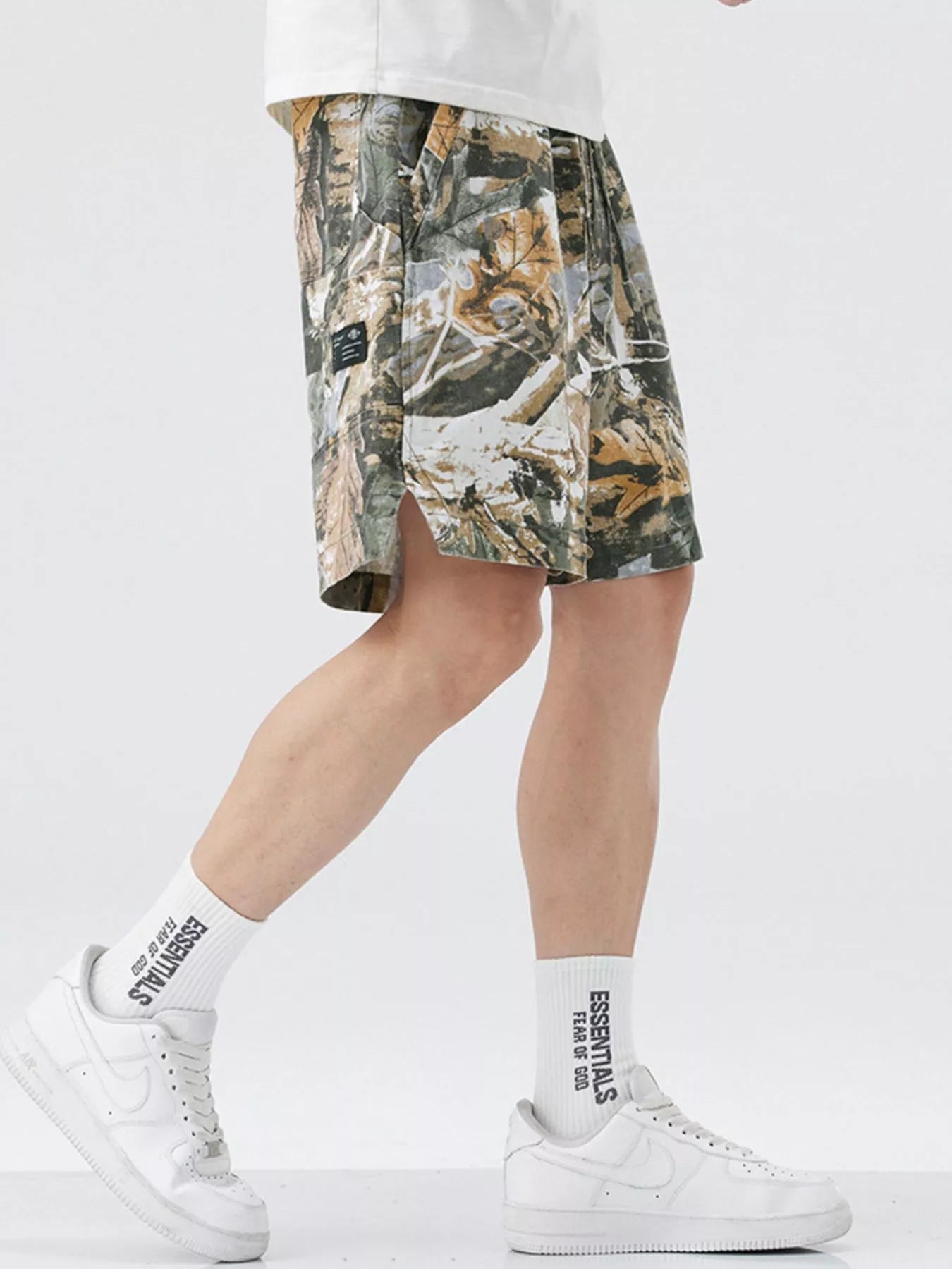 Men's loose fit shorts with a drawstring waist and pockets.