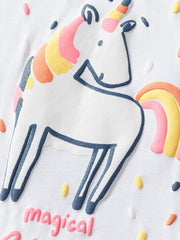 Close view of the white children's tee unicorn graphic with a rainbow mane tail and confetti dots