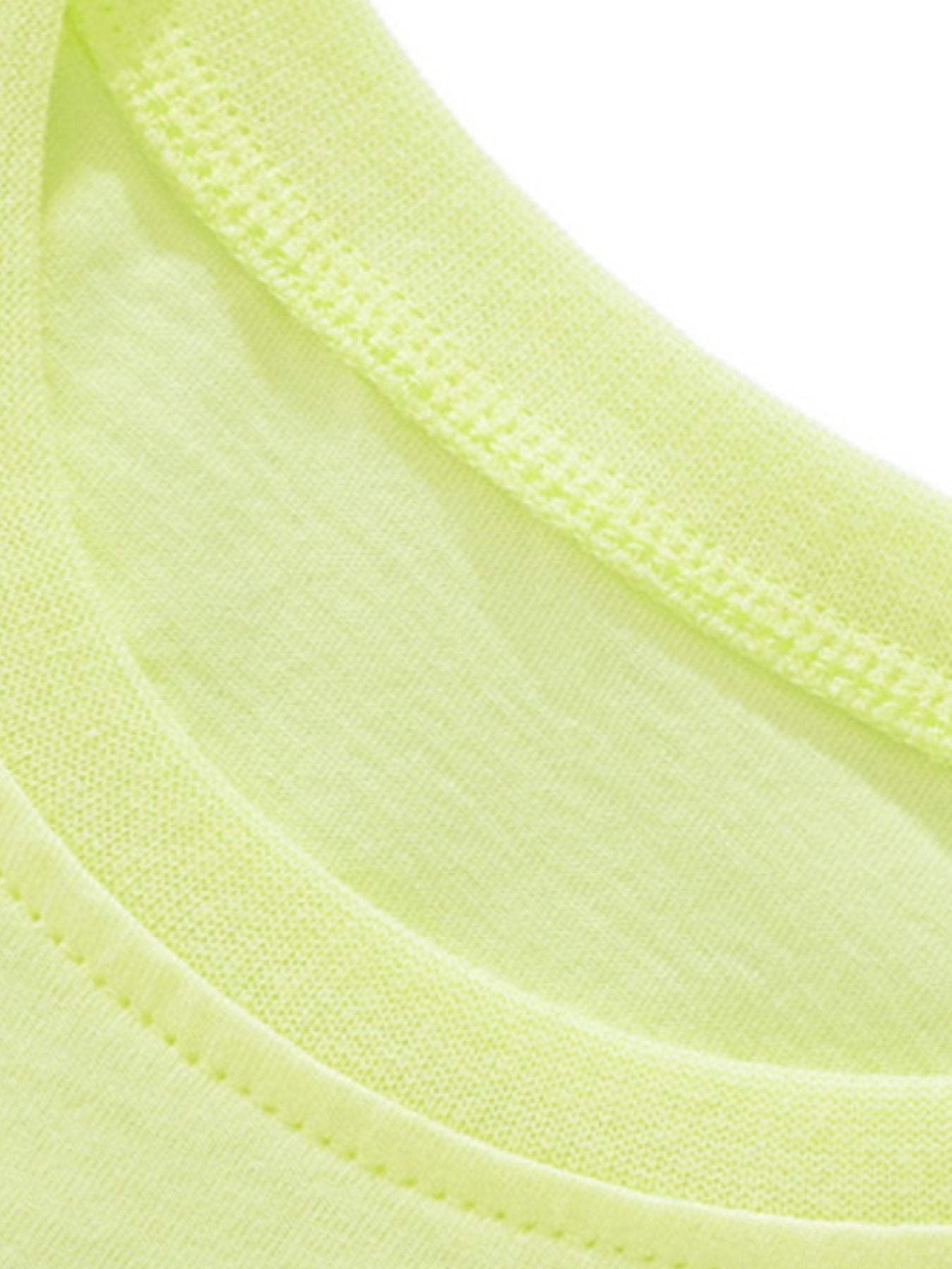 Close-up of the neckline stitching and soft fabric on the children's light green t-shirt