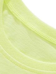 Close-up of the neckline stitching and soft fabric on the children's light green t-shirt
