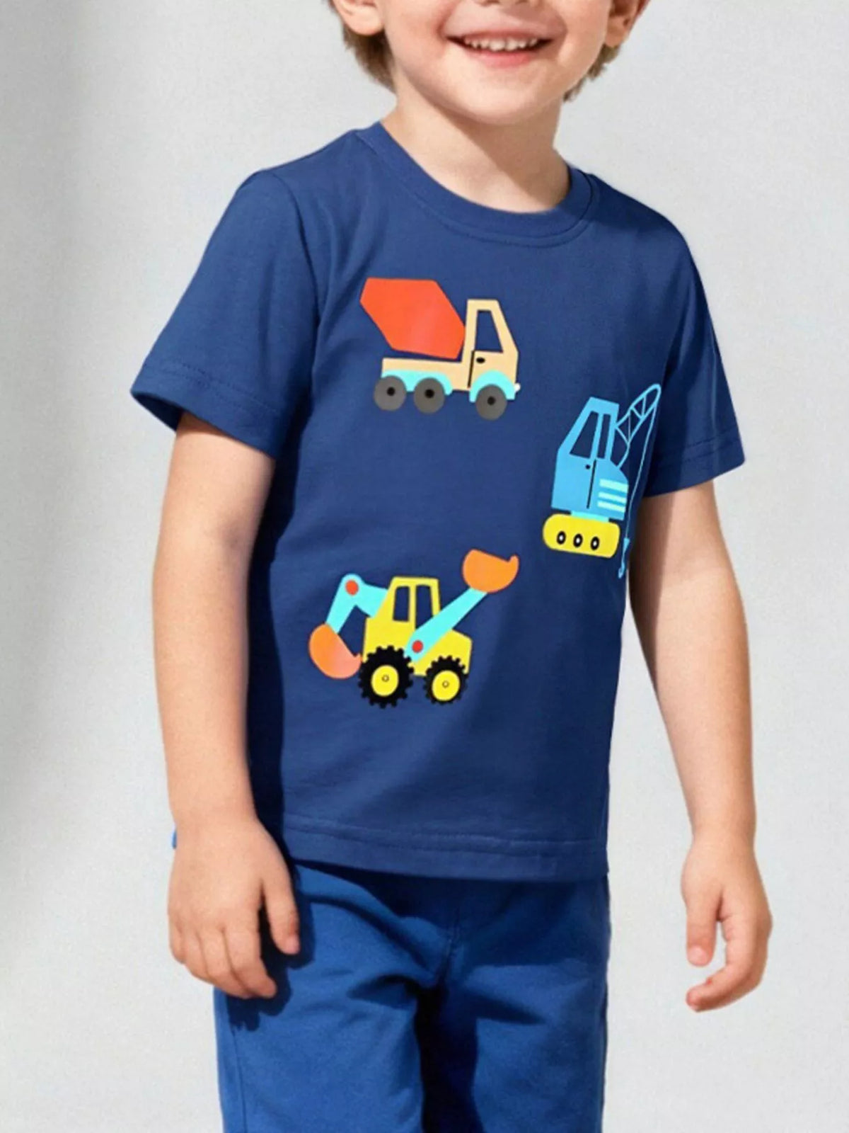 Children's navy crew-neck T-shirt featuring a construction vehicle design and short sleeves.