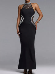 Black sleeveless maxi dress with pearl halter mesh neckline and sheer waist panels in front view