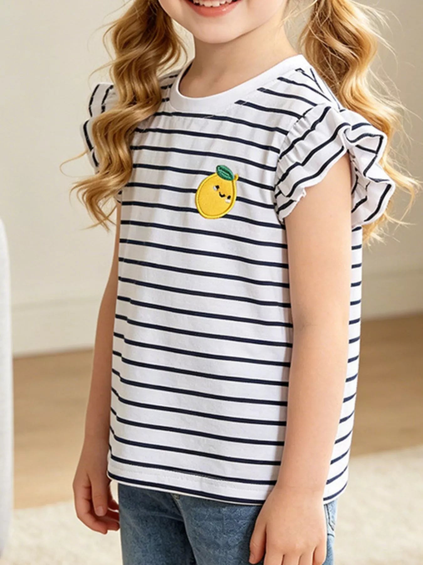 White children's striped ruffle sleeve t-shirt with a small yellow lemon applique on the chest