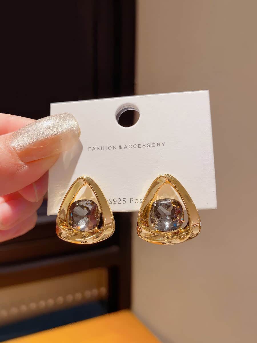 Chic Gold Tone Drop Earrings with Geometric Blue Smooth Accent Gold