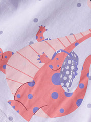 Close view of the pink dinosaur with a polka dot backpack on lavender fabric