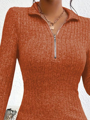 Close up of ochre ribbed knit mini dress collar and half zip neckline