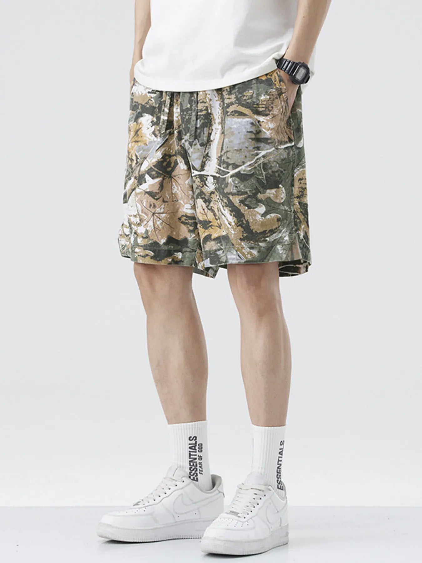 Men's loose fit shorts with a drawstring waist and pockets.