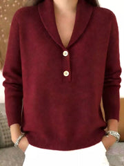 On-model front view of a burgundy shawl collar sweater with cream buttons