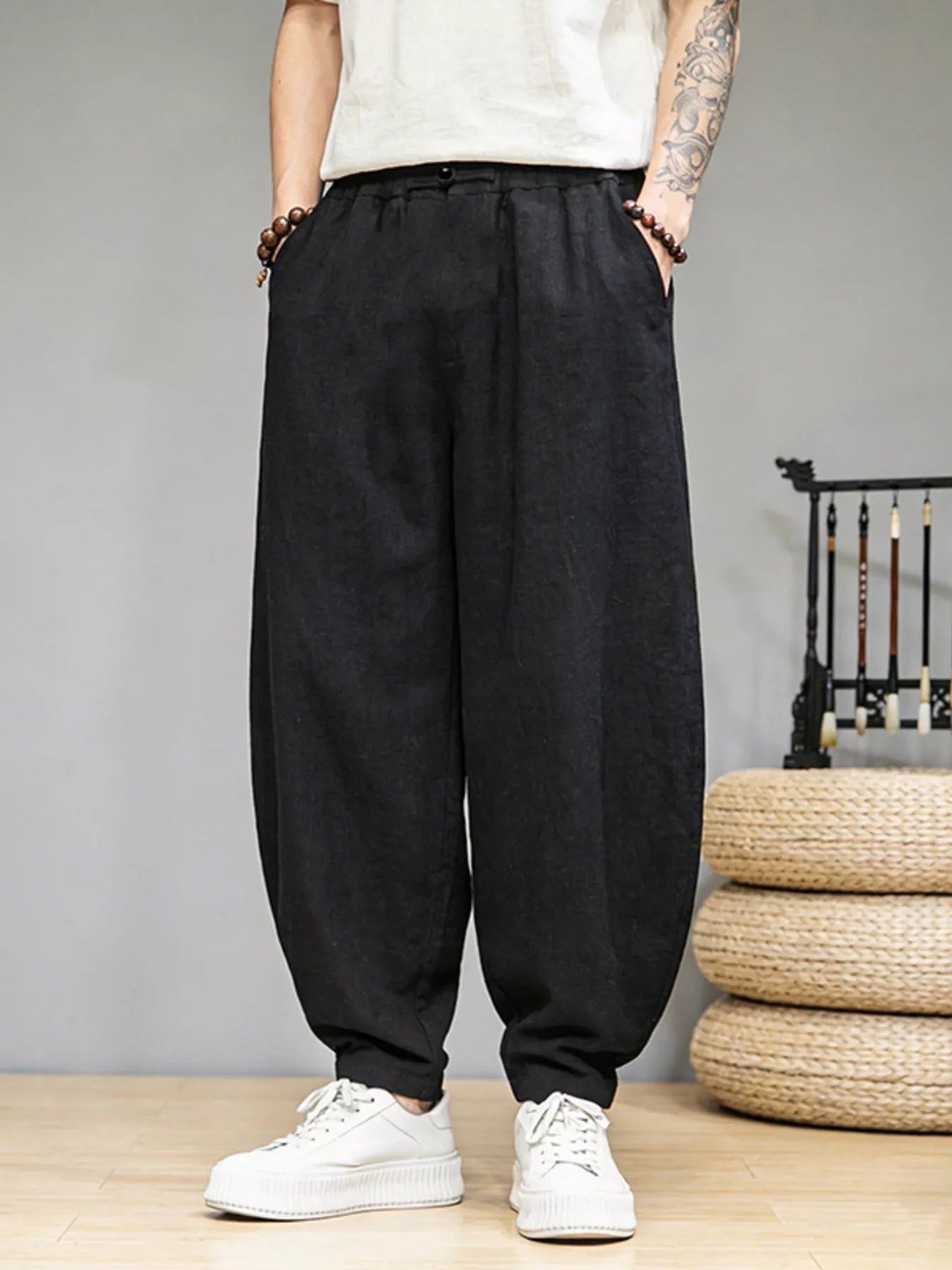 Men's casual loose fit pants with pockets.