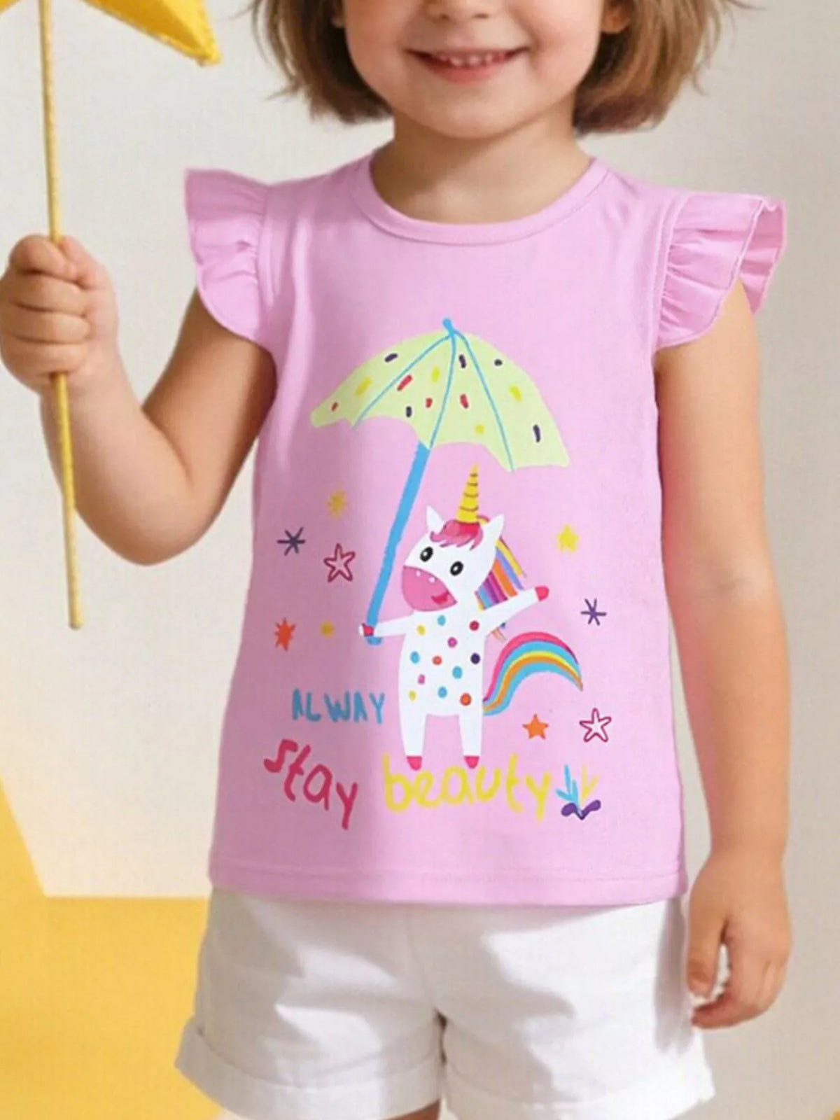 Children's pink T-shirt with a unicorn graphic and ruffle sleeves.