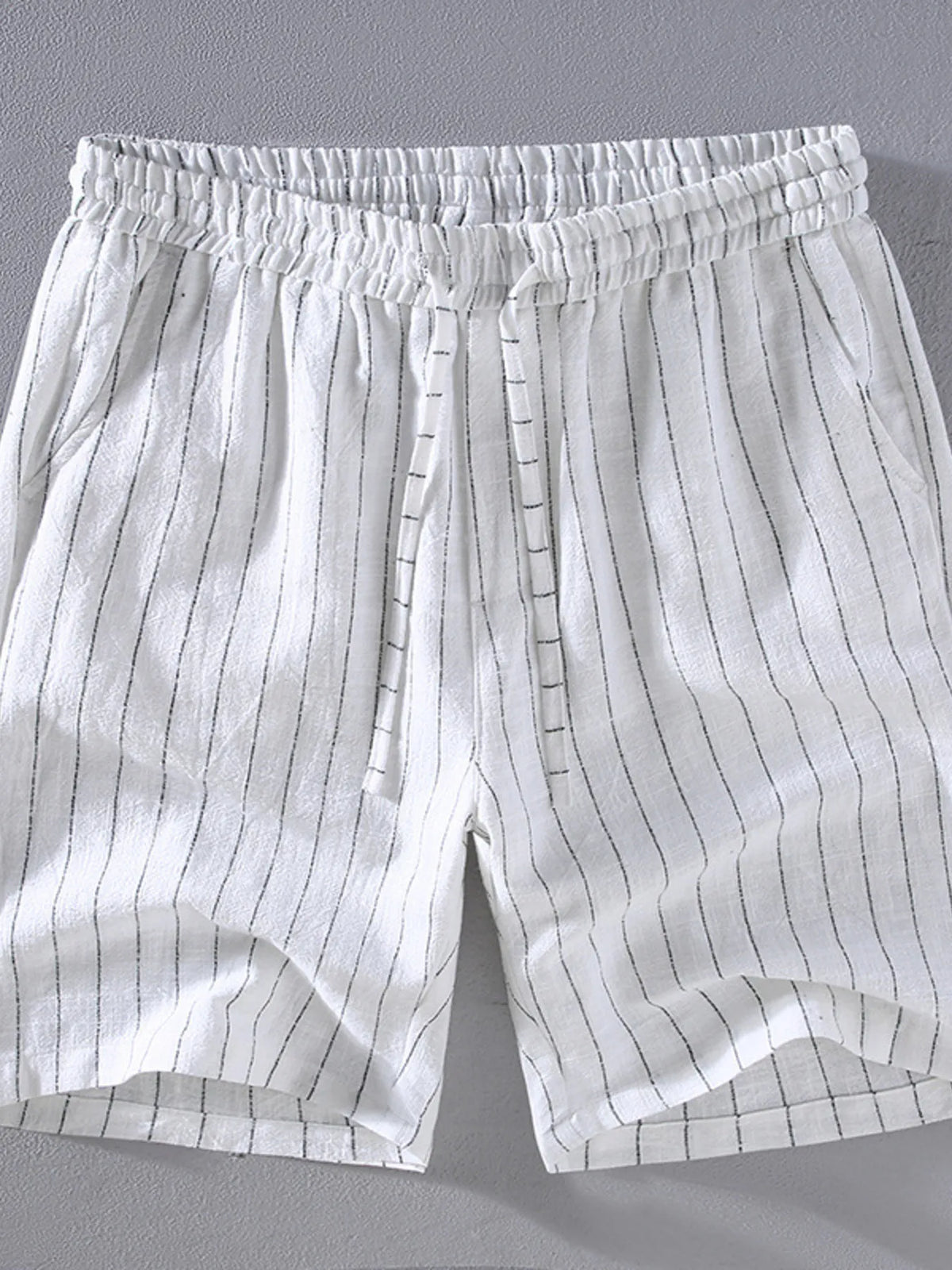 Men's white striped shorts with a drawstring waist, available in plus sizes.