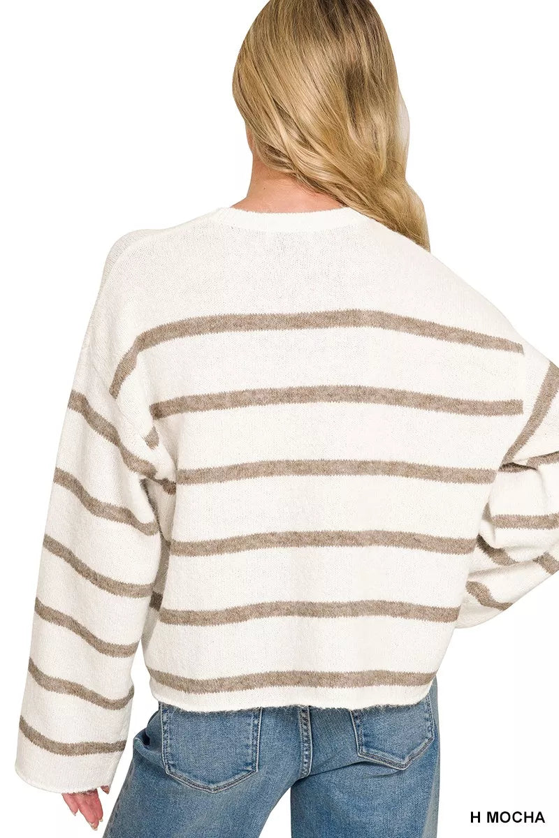 Back view of cream striped sweater with mocha stripes and long sleeves.