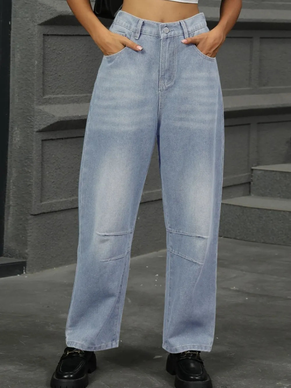 Women's straight-leg jeans with a half-elastic waistband and slightly stretchy fabric.