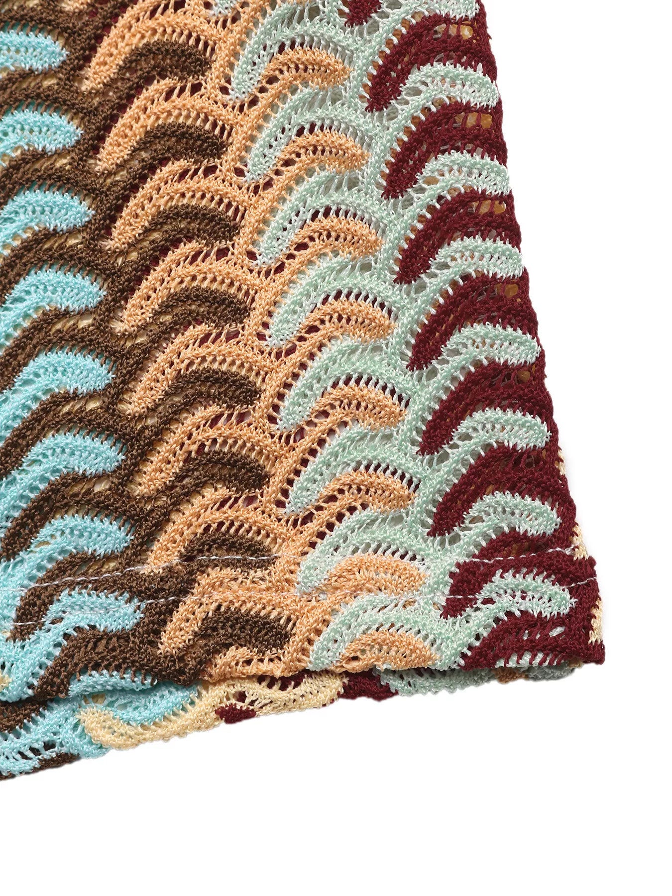 Close view of khaki striped midi dress hem and crochet knit texture