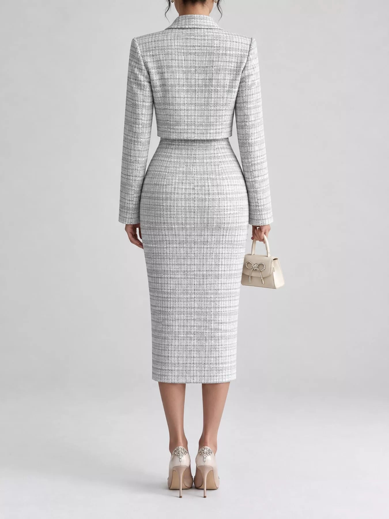 Back view of black and white tweed dress worn with the cropped cardigan