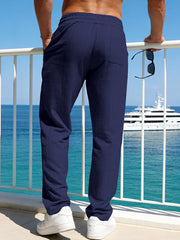 Men's casual striped pants with a drawstring waist and pockets.