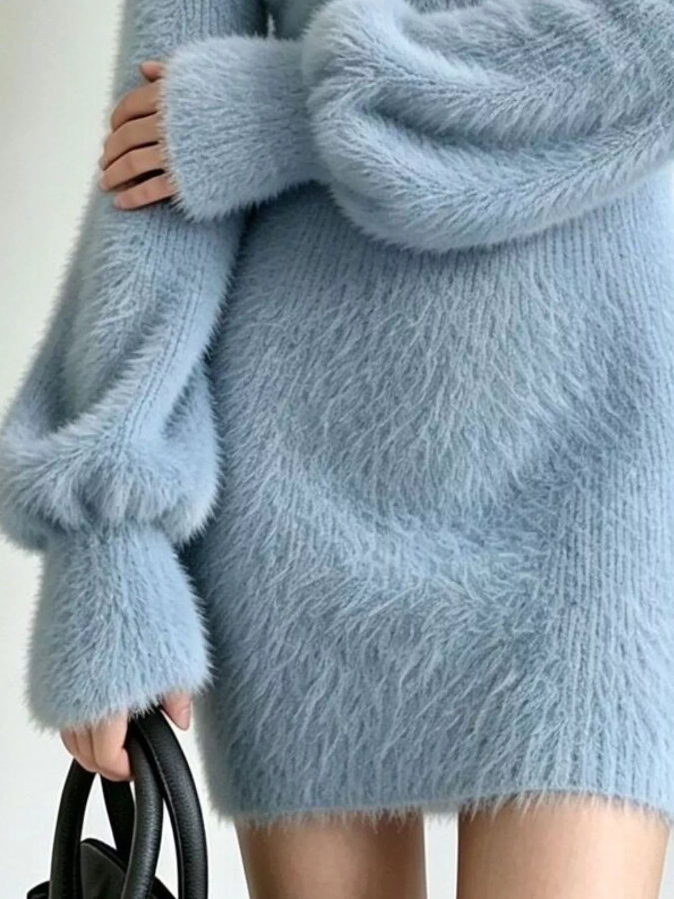 Sky blue fuzzy knit sweater dress, close side view of puff sleeve and knit texture
