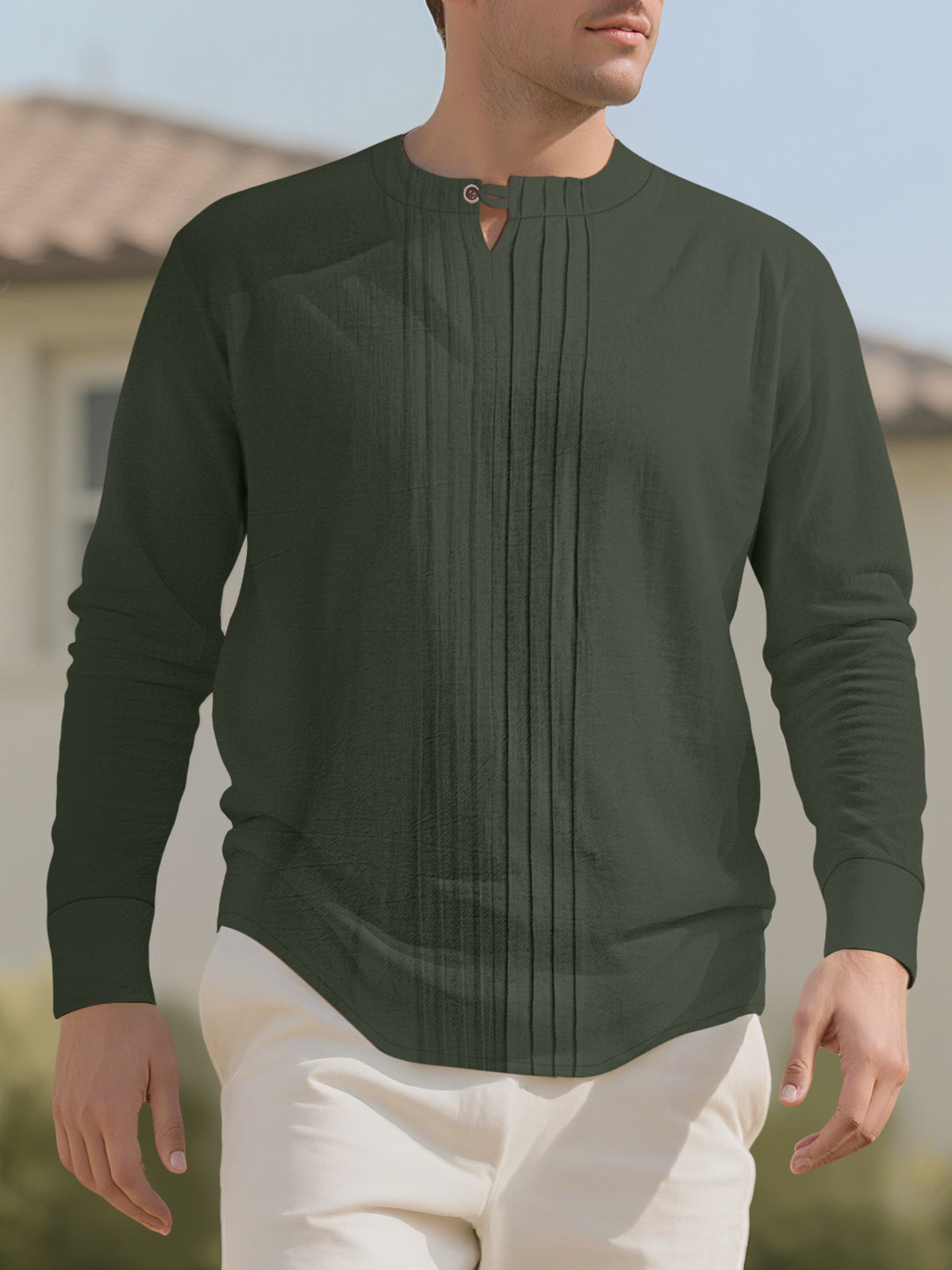 Men's pleated long-sleeve blouse with button detailing in a cotton-spandex blend.
