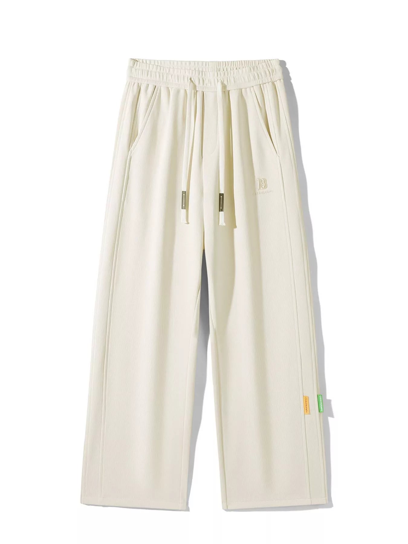 Men's casual loose fit pants with a drawstring waist and pockets.
