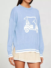 Side angled view of the light blue dropped shoulder sweater with a white golf cart graphic.