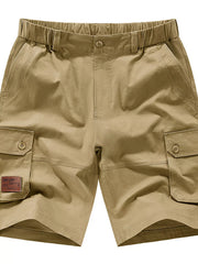 Men's khaki plus-size shorts with an elastic waist and pockets.