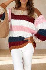 Front view of multicolor striped knit sweater with shoulder bag indoors