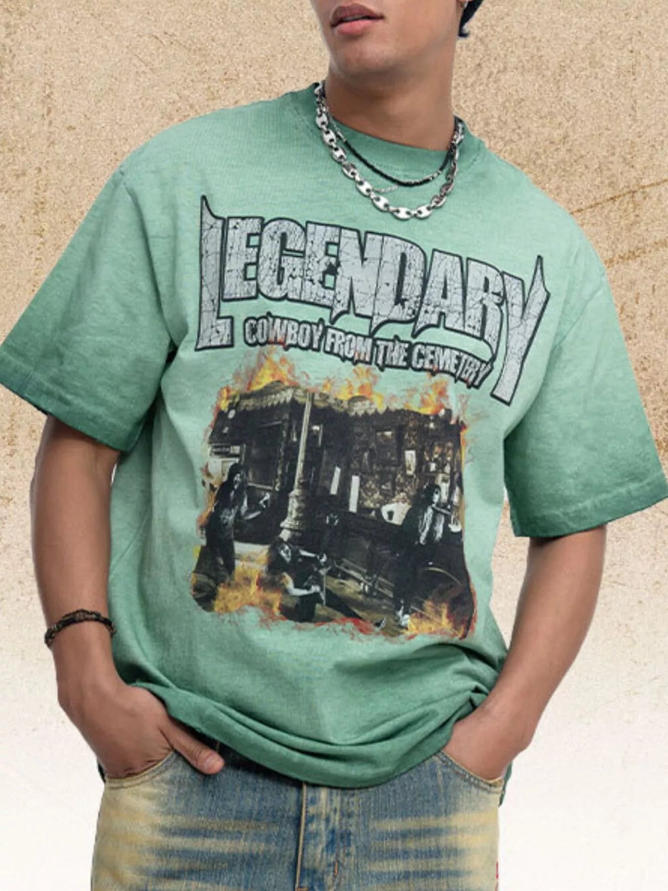 Men's graphic T-shirt featuring a round neckline and printed design.