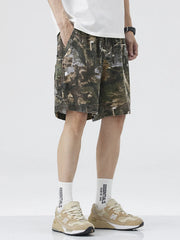 Men's loose fit shorts with a drawstring waist and pockets.