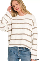 Front view of cream striped sweater with mocha stripes and round neckline.