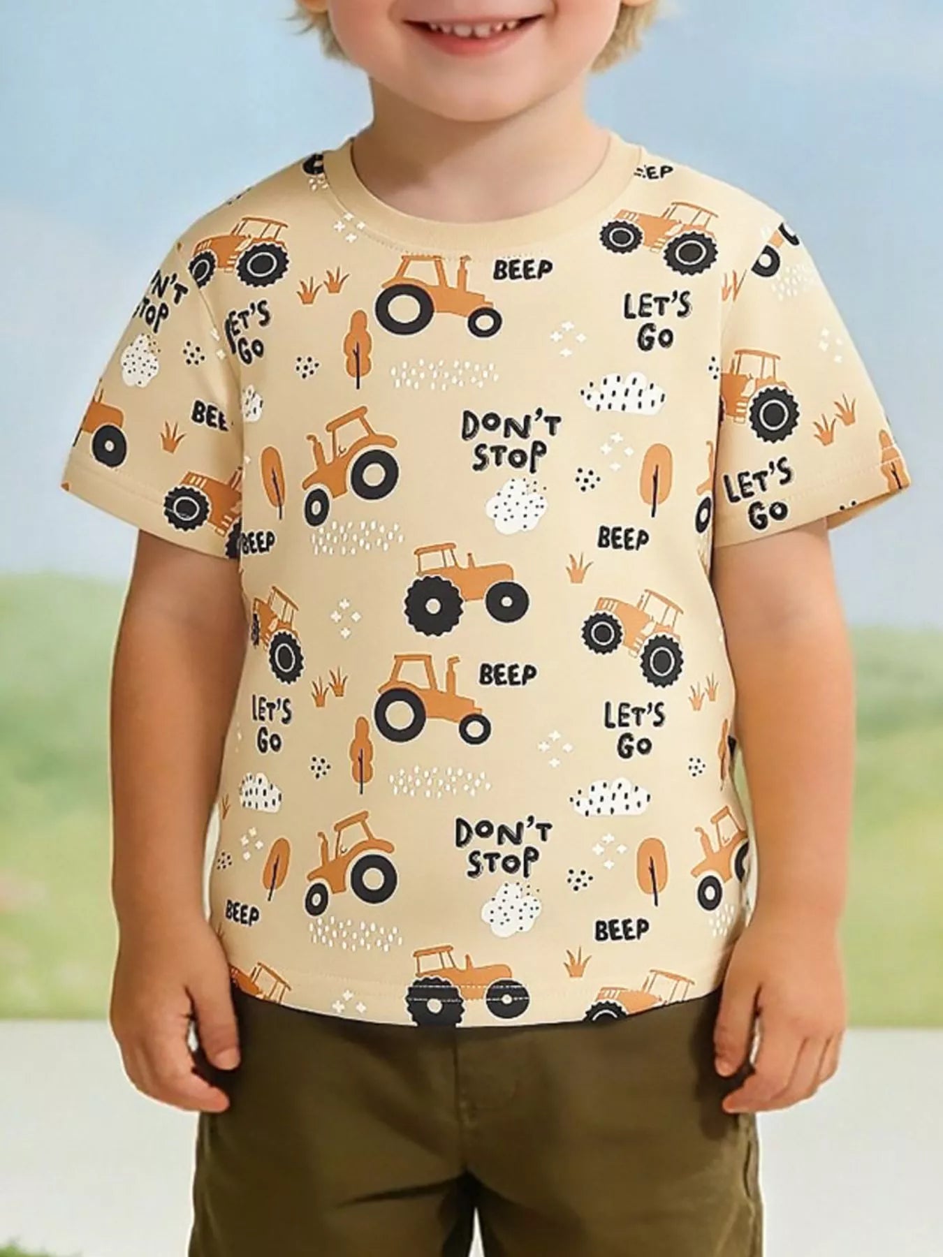 Children's multicolor crew-neck T-shirt featuring a tractor print and short sleeves.