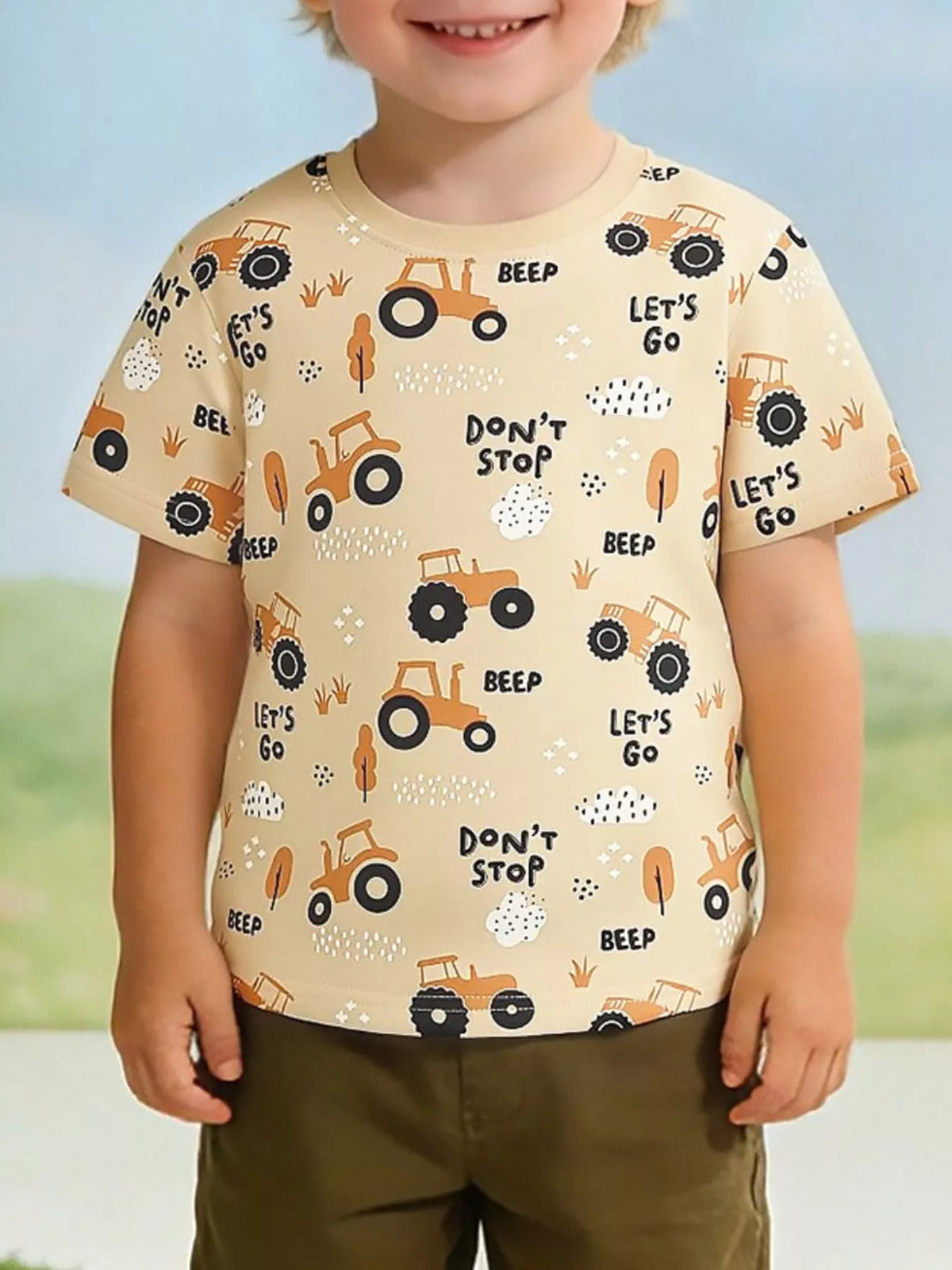 Children's multicolor crew-neck T-shirt featuring a tractor print and short sleeves.