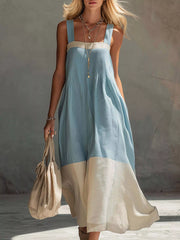 Front full length view on model of light blue color block sleeveless linen blend midi dress