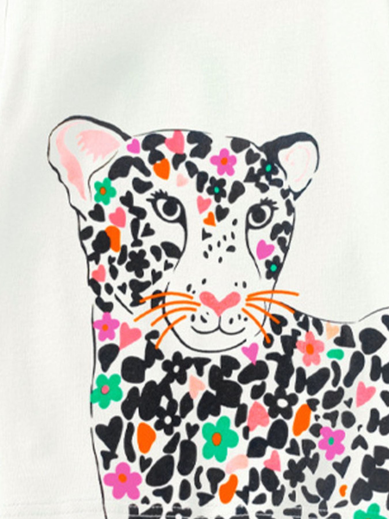 Close-up of the leopard face with black spots, pink hearts, and colorful flowers