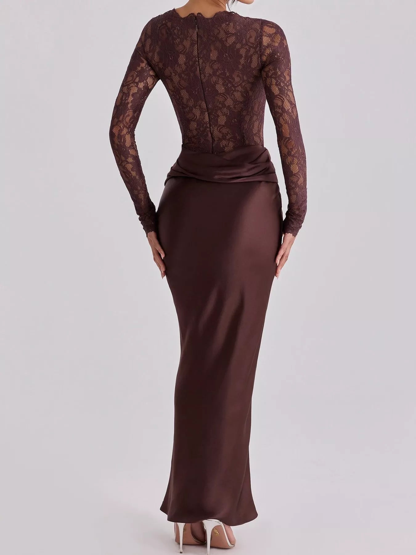 Back full length view of dark red lace bodice and satin maxi dress in studio
