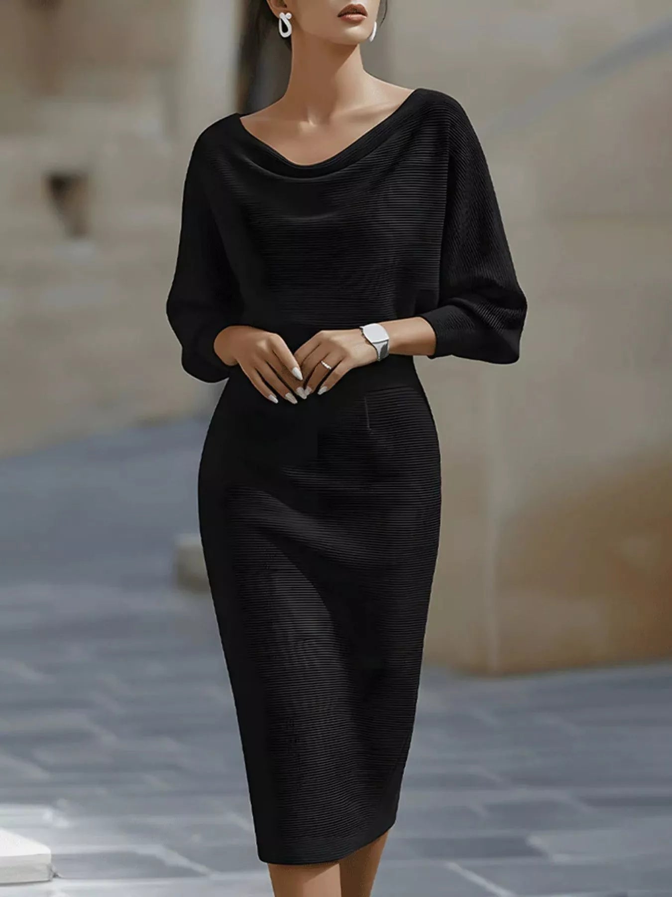 Front view of a dark gray cowl neck bodycon midi dress with three quarter sleeves outdoors