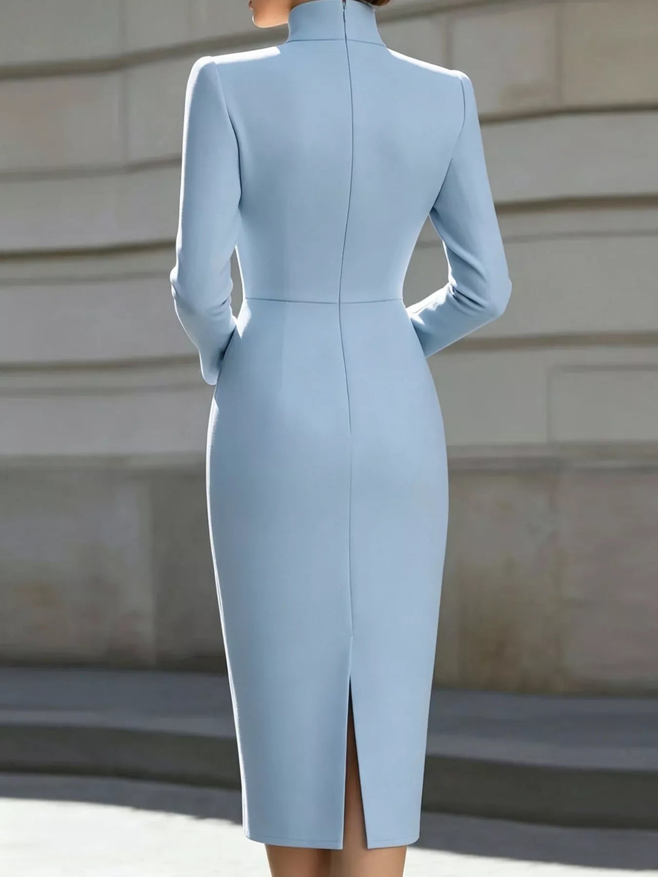 Back view of sky blue stand collar long sleeve midi dress with back slit outdoors
