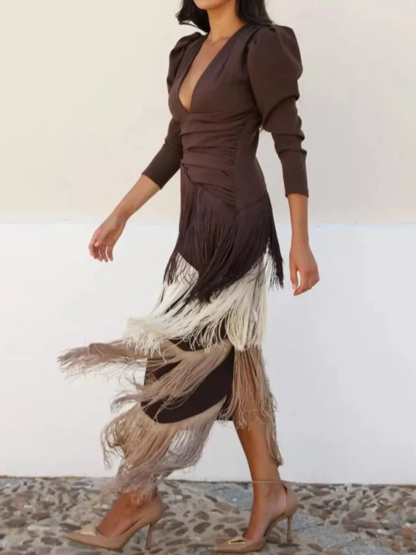 Side view of a coffee brown fringed maxi dress with cream and taupe fringe tiers