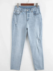 Mid Rise Ankle-Length Distressed Skinny Jeans