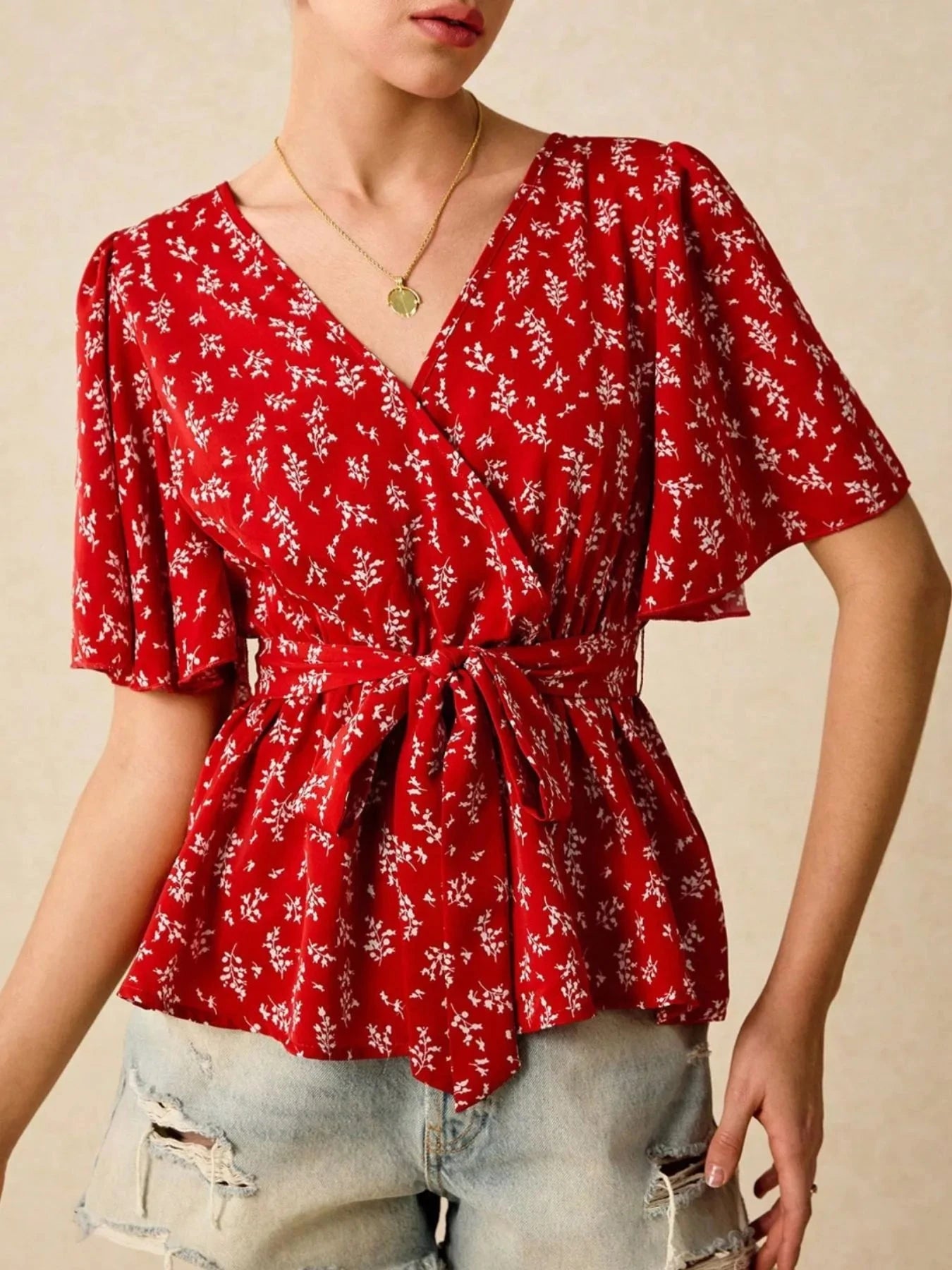 Printed Surplice Flutter Sleeve Blouse