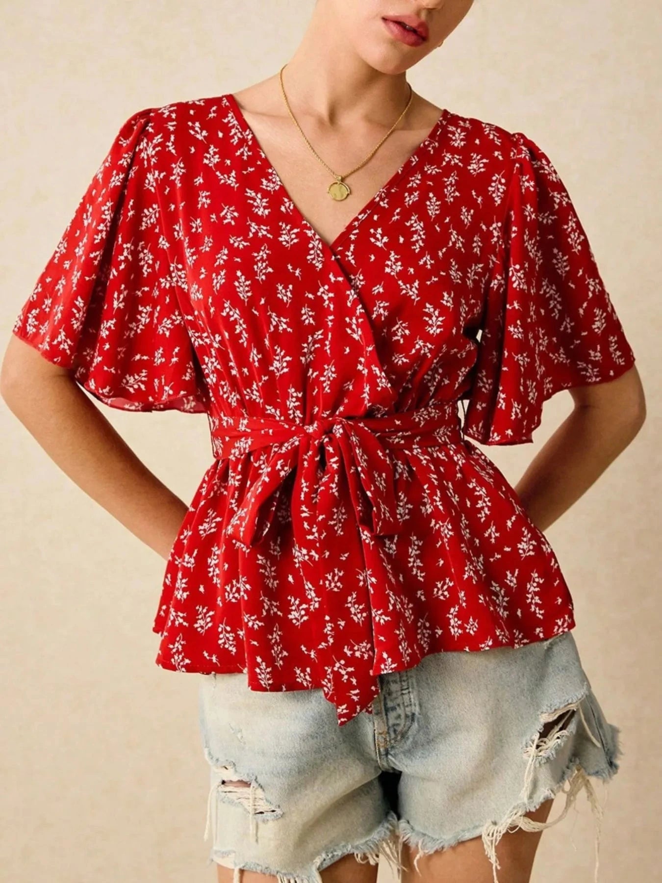 Printed Surplice Flutter Sleeve Blouse