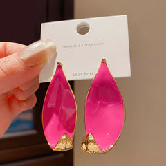 Stylish Gold Tone Abstract Leaf Drop Earrings with Vibrant Hot Pink Enamel Inlay