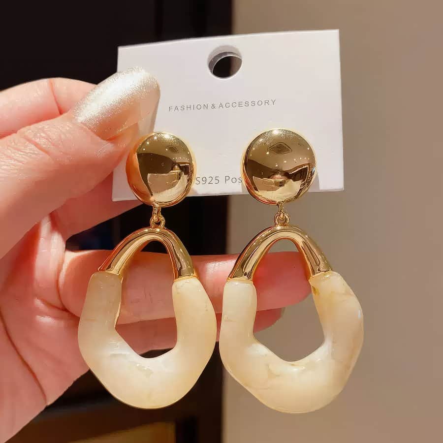 Stylish Gold Tone Drop Earrings with Round Top and Irregular Creamy White Geometric Inset Gold