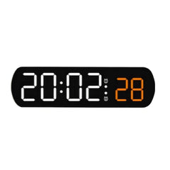 Voice-controlled digital alarm clock with timer, temperature display, and dual alarm